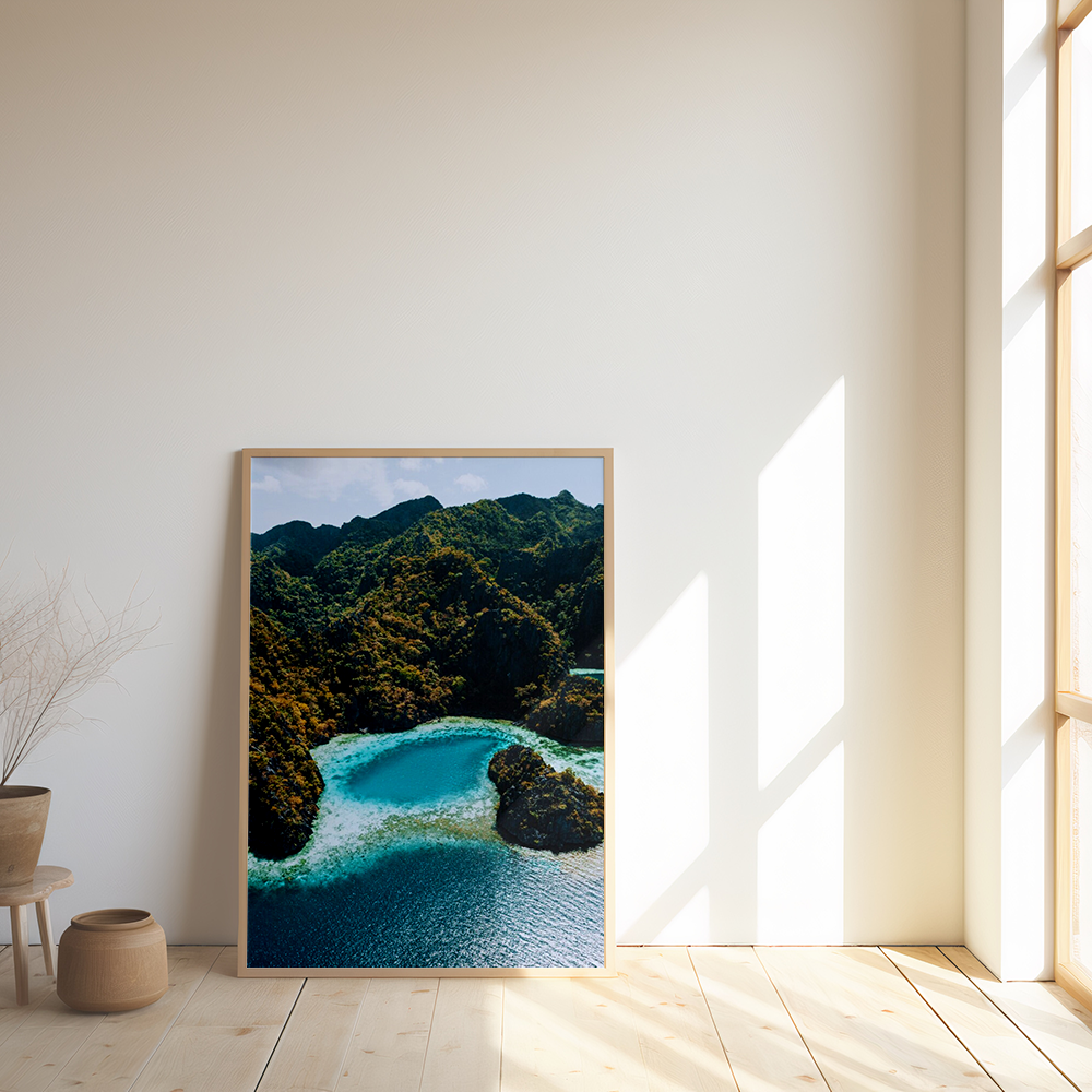 Aerial shot ocean surrounded by mountain